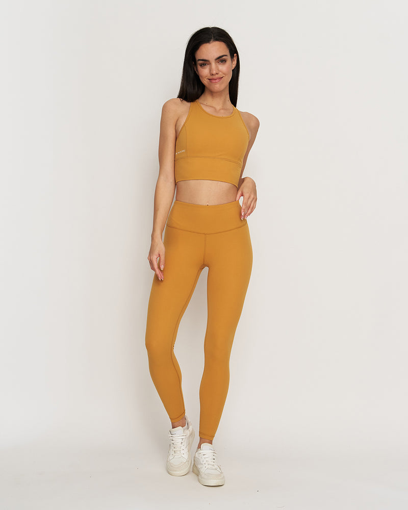 Kuuno Essential Movement Bra Spicy Pumpkin Fabrikverkauf